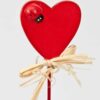 voor moderdag of valentijn: hart met lieveheersbeestje en strikje op stok