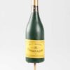 champagneflesje op stok