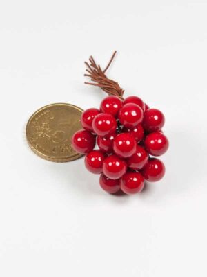 rode besjes vergeleken met 50 ct munt